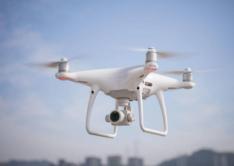 How does the self-repair function of the flight control system ensure the safety of drone flights？